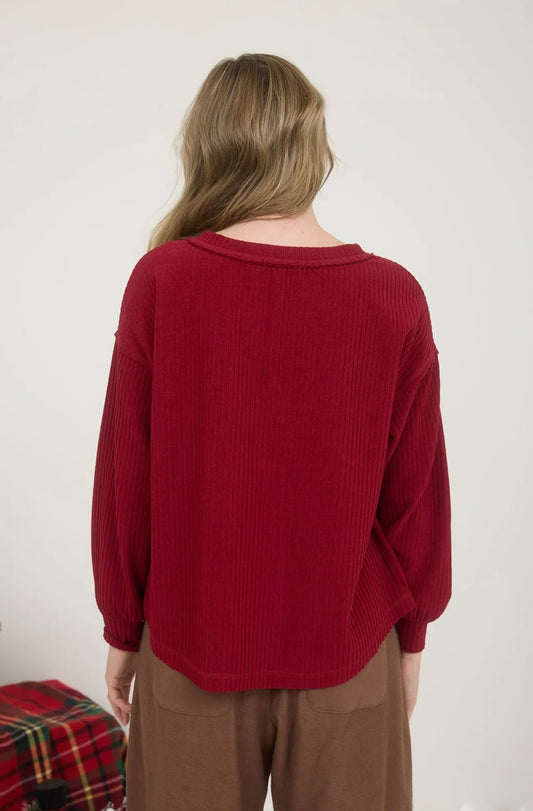J6ST1001 RIBBED HENLEY LONG SLEEVE EXPOSED SEAM KNIT TOP